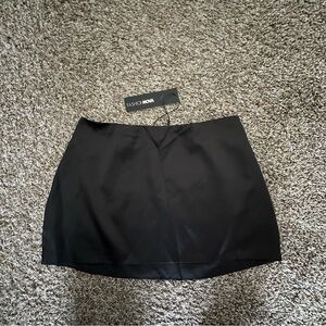 Black satin mini skirt
